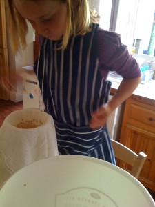 straining elderflowers